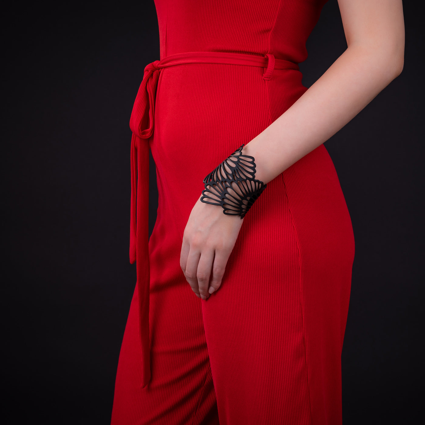 Paguro Upcycle recycled rubber bracelet with intricate butterfly design worn on wrist