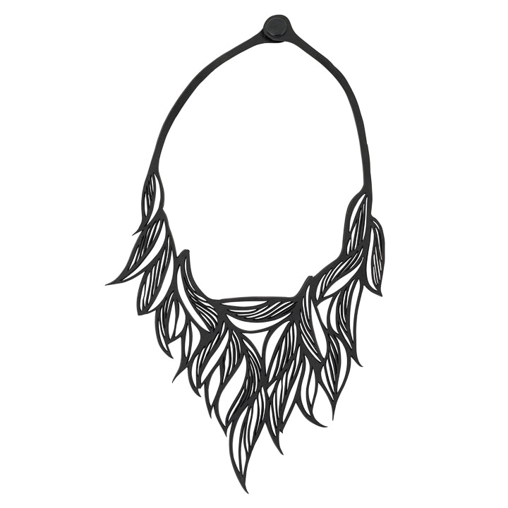 Paguro Upcycle black recycled rubber necklace with intricate leaf-like design and adjustable closure