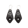 Paguro Upcycle black recycled rubber earrings with floral cutout design and silver hooks