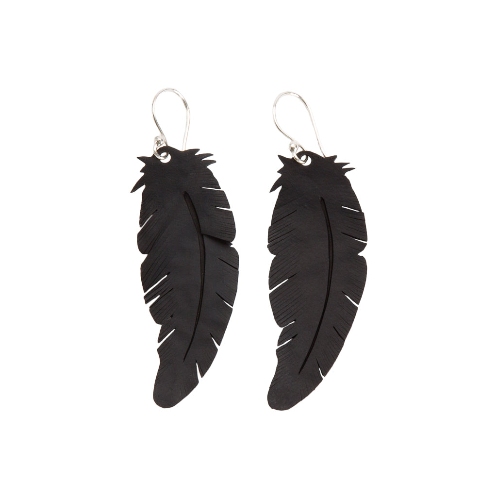 Paguro Upcycle upcycled rubber feather earrings in black with silver hooks eco-friendly jewelry