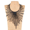 Paguro Upcycle black unique design upcycled statement necklace displayed on a woven bust
