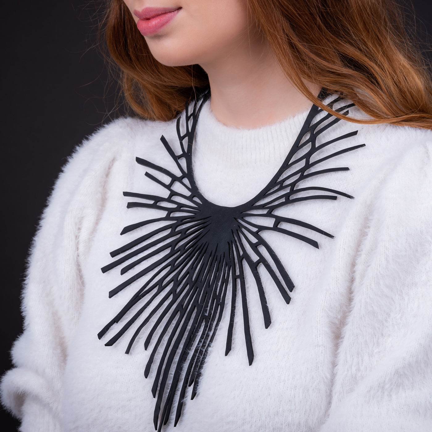 Paguro Upcycle black unique upcycled statement necklace worn on white sweater