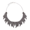 Paguro Upcycle black upcycled inner tube necklace with leaf-shaped cutout design and silver chain