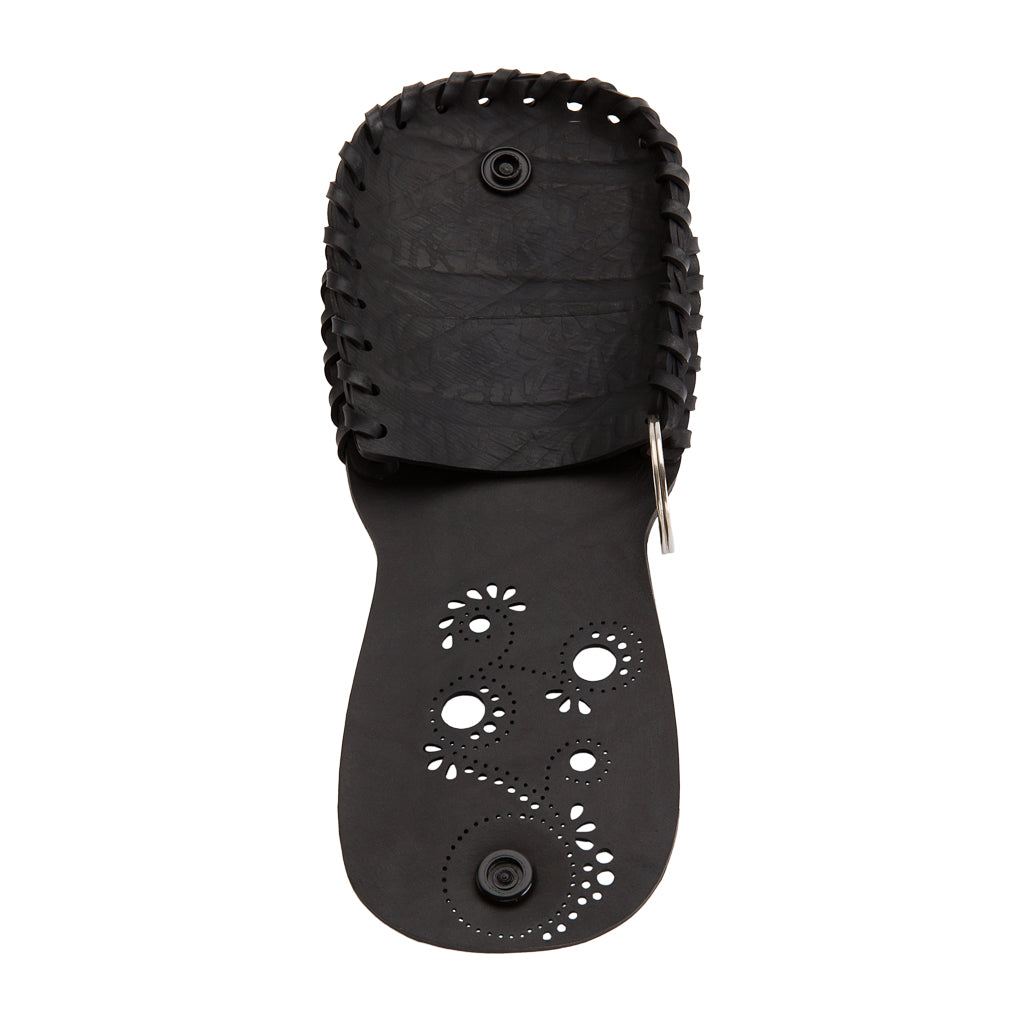 Paguro Upcycle black vegan coin purse with decorative cutouts and secure snap closure